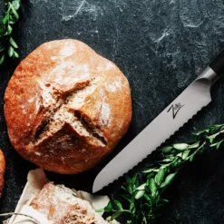 Comfort Pro Serie 6" Allzweckmesser Wellenschliff 56 HRC Edelstahl -Küchenzubehör Verkaufsgeschäft 10039034 yy 0004 logo